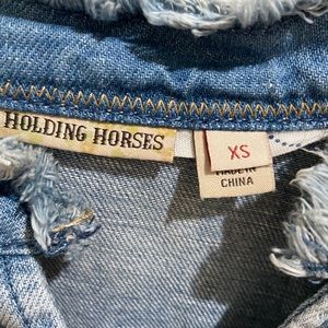 Holding Horses Top
